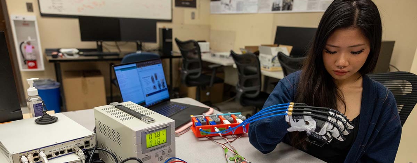 Student working on bionic hand project in Quintero lab