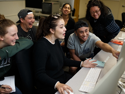 Group of students working on their laptops